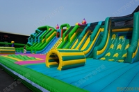 Parc d'attractions gonflable géant commercial multi-glissades et parcours d'obstacles pour enfants, idéal pour la location