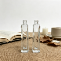 Vente en gros de flacons de parfum en verre transparent carrés à fond épais de 10 ml et 15 ml, flacons de parfum vides rechargeables avec atomiseur