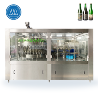 Machine de remplissage et de bouchage isobare 3-en-1 entièrement automatique pour bouteilles en verre, avec capsuleuse à couronne PLC pour bière, soda et eau pétillante
