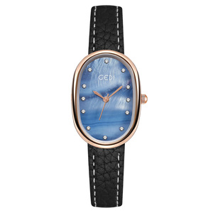 Montre à quartz pour femme avec un cadran ovale minimaliste en nacre de mer profonde et un bracelet en cuir grainé litchi écologique - Product Image 5