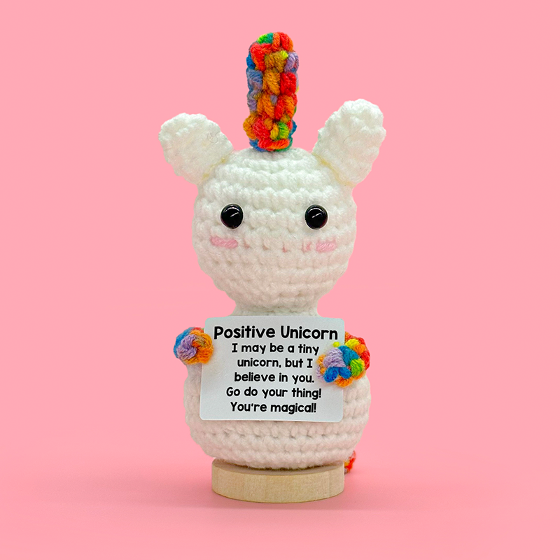 White Unicorn with Rainbow Hand