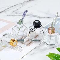 Bouteille de parfum en verre sans flamme incolore à six faces pour voiture et usage domestique bouteille de diffuseur d'huile essentielle et de rotin