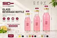 Chine Fabrication OEM Logo 250ml 350ml 500ml Boissons Jus Bouteilles en verre pour jus en vrac avec couvercles