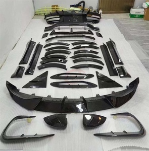 Pour <span class=keywords><strong>Aston</strong></span> <span class=keywords><strong>Martin</strong></span> DBX M Style Bodykit fibre de carbone sèche lèvre avant garde-boue jupe latérale diffuseur arrière aileron arrière tuyau d'échappement - Product Image 2