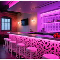 Comptoir de bar en pierre solide sur mesure avec éclairage LED translucide pour usage commercial en boîte de nuit