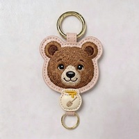 Porte-clés brodé mignon de haute qualité en métal et cuir PU, mini-breloque de sac personnalisée pour les fêtes