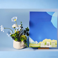 Brochure personnalisable en papier couché 157g avec carton gris de montage et installation à anneaux rigides