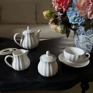 Wholesale White Ceramic <b>Tea</b> <b>Pot</b> <b>Set</b> Milk Creamer Pitcher Porcelain Coffee Cup and Saucer Afternoon <b>Tea</b> <b>Set</b> - Product Image 2