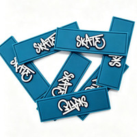 Patch logo 3D personnalisé en silicone, caoutchouc souple et PVC