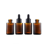 Botella de vidrio ámbar cilíndrica de hombro plano de gran venta, 20ml, 30ml, 60ml, con bomba dosificadora para loción/spray, impresión de superficie grabada con ácido