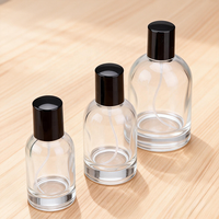 Vente en gros OEM, flacon pulvérisateur en verre transparent personnalisé avec pompe pulvérisatrice pour huile essentielle d'aromathérapie, parfum, 30 ml, 50 ml, 100 ml