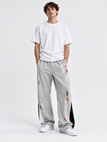 Pantalon de jogging ample pour homme, style streetwear, avec effet éclaboussures de peinture, patchwork et imprimé graphique, personnalisable, marque privée, vente en gros