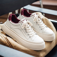 Nouvelle tendance, baskets à plateforme pour hommes avec motif imprimé, logo personnalisé, patchwork noir et blanc, chaussures de skate en cuir, vente en gros