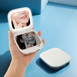 Best-seller Miroir de maquillage intelligent à détection de crème solaire Miroir de beauté pliant à LED personnalisé Miroir portable avec batterie externe - Product Image 1