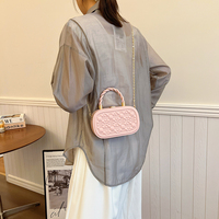 Sac à main rigide ovale gaufré avec poignée tressée et chaîne en PU, sac bandoulière pour femme, idéal pour les soirées