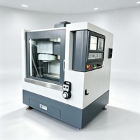Máquina Herramienta CNC de Alta Precisión XH7115B con Precisión de 0.015 mm, Carga de Mesa de 30 kg, Cargador de Herramientas de 10 Estaciones, 380 V, 1 Año de Garantía