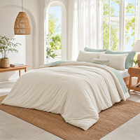 Couette matelassée en polyester en gros, douce, moderne, lavable, toutes saisons, avec taies d'oreiller
