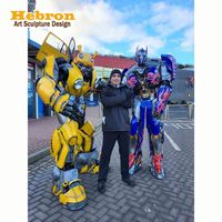Kostum Cosplay Robot LED Kuning Dewasa Hebron Hot Sale dengan Setelan Celana Trench Tinggi 2,5 M Maskot LED untuk Pesta Halloween