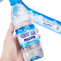 Etiquettes d'emballage de bouteille d'eau avec logo personnalisé de qualité supérieure Solution de manchon thermorétractable pour boissons imperméables Services d'impression de produits de qualité supérieure
