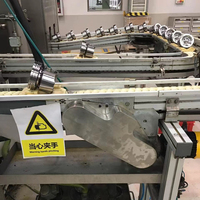 Convoyeur circulaire à chaîne flexible personnalisable pour lignes de production multi-produits