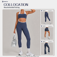 Ensemble de yoga deux pièces color block avec haut dos nu sans manches à coussinets amovibles et short taille haute à bordure contrastante pour l'extérieur