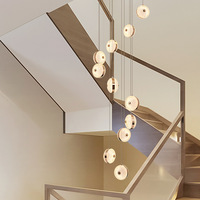 Luminaires suspendus ronds à LED de luxe pour hall de villa, salon, et lustres modernes à double hauteur pour escalier