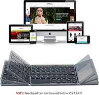 Logo kustom Travel ABS 64 tombol ramping bluetooth nirkabel Tri lipat Keyboard lipat portabel dengan Touchpad