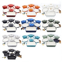Ensemble de batterie de cuisine en fonte émaillée multicolore au design classique, comprenant un faitout, une cocotte, une poêle et une collection de plats de cuisson en métal émaillé