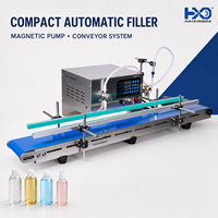 Machine de remplissage automatique de liquides à pompe magnétique de petite taille pour la production de bouteilles d'huiles essentielles, de parfums et de cosmétiques