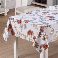 Nappe de table en PVC RNPT avec motifs de fleurs et feuilles d'automne marron imprimés au laser sur fond blanc et support en tissu pour tables à manger
