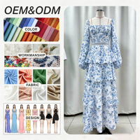 Robe longue évasée à volants, fabriquée en usine, pour femme, romantique, à imprimé floral bleu sur fond blanc, idéale pour les vacances et les rendez-vous chics