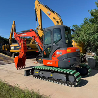 Mini-excavatrice sur chenilles Kubota U55-5 d'occasion, 5,5 tonnes, avec pince hydraulique, attache rapide, moteur EPA, prête à l'emploi