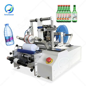Machine d'étiquetage semi-automatique OCEAN pour petites bouteilles en plastique, yaourt, vin, avec colle thermofusible - Product Image 1