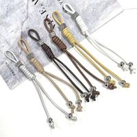 Porte-clés rétro coloré en cuir PU tressé, bracelet de poignet nœud romain, breloque de sac à perles métalliques, cordon de téléphone, pendentif de bagage
