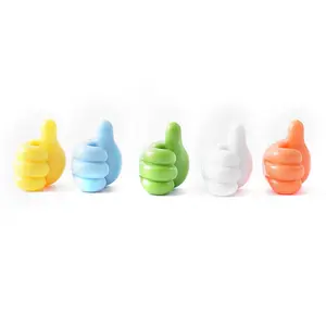 Tự dính Silicone ngón tay cái móc đa chức năng ngón tay cái lên tường móc