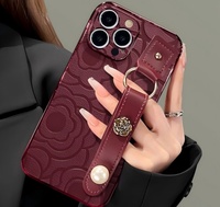 Étui de téléphone de luxe en cuir texturé Camélia avec dragonne pour iPhone 16 15 14 13 Pro Max Plus, coque arrière antichoc en cuir avec cordon