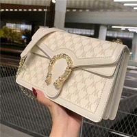 Sac à bandoulière classique à rabat pour femme de marque de créateur - Sac à chaîne rétro tendance à porter en bandoulière ou à l'épaule.1002