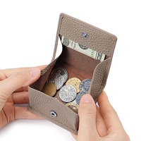 Porte-monnaie mini en cuir véritable ODM OEM, ultra fin, portable, avec bouton-pression, petite pochette de rangement, texture litchi, portefeuille multicolore