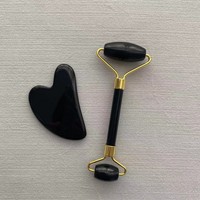 Planche de massage Gua Sha en obsidienne en forme de cœur, pour le visage, avec rouleau, provenance Guangdong, pour le commerce international et les diffusions en direct