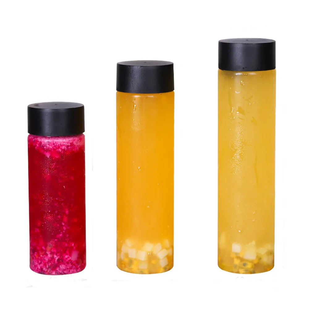 Botellas cilíndricas de plástico transparente para mascotas con logotipo personalizado de 400ml con tapa para negocios de jugos
