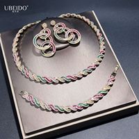 Parure de bijoux Rétro en Zirconium à motif spirale, dorée, comprenant un collier, des boucles d'oreilles chandelier à triple anneaux entrelacés et un bracelet