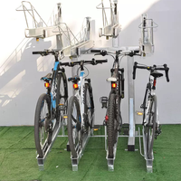 Support de stationnement pour vélos à double couche en acier au carbone et en alliage d'aluminium en spirale pour la communauté résidentielle et les installations publiques