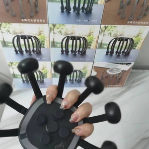 Masseur électrique pour la tête, masseur du cuir chevelu japonais, masseur en forme de pieuvre pour la relaxation de la tête et le soulagement du stress - Product Image 2