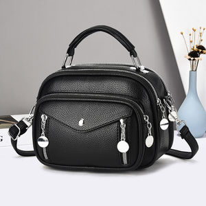 Sac messager pour femme en PU de haute qualité. Avec une fermeture éclair. Conçu par un designer renommé.9331 - Product Image 1