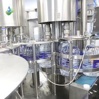 Ligne de production entièrement automatique rotative pour le lavage, le remplissage et l'emballage de bouteilles d'eau de 3L, 5L, 6L, 7L, 10L - Machine de remplissage de bouteilles d'eau