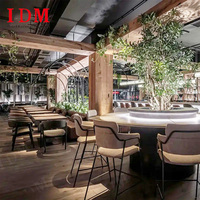 IDM personnalisé en gros lumière luxe hôtel Restaurant meubles en bois massif Table à manger ensemble de chaises en cuir Solution unique