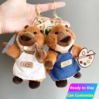 Al por mayor Llavero de peluche de capibara personalizado, mini muñeco de artista pintor, decoración con espátula, colgantes para bolso y adornos para llavero de coche