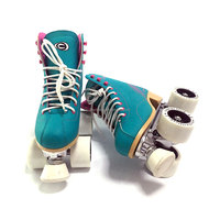 Patins élégants Patins à roulettes Patins souples Quad pour le divertissement à la patinoire intérieure