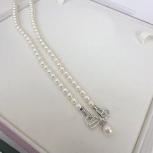 Collier en perles d'eau douce de luxe français de 5 à 6 mm, personnalité à la mode avec une chaîne de clavicule chic - Product Image 1