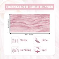 Chemin de table en gaze rose et vert sauge, style bohème, pour décoration de table de mariage, de dîner ou d'événement, en tissu gaze.